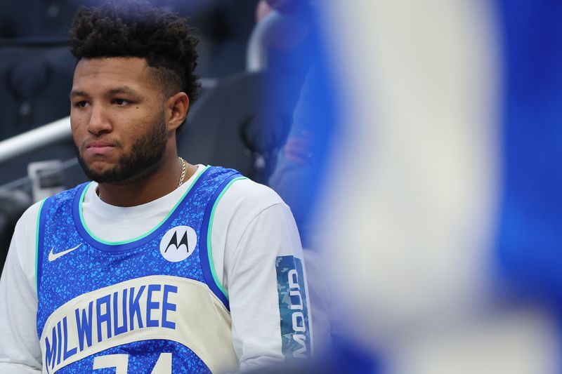 MILWAUKEE, WISCONSIN - DECEMBER 02: Jackson Chourio of the Milwaukee Brewers watches action during a game between the Milwaukee Bucks and the Atlanta Hawks at Fiserv Forum on December 02, 2023 in Milwaukee, Wisconsin. NOTE TO USER: User expressly acknowledges and agrees that, by downloading and or using this photograph, User is consenting to the terms and conditions of the Getty Images License Agreement. (Photo by Stacy Revere/Getty Images)