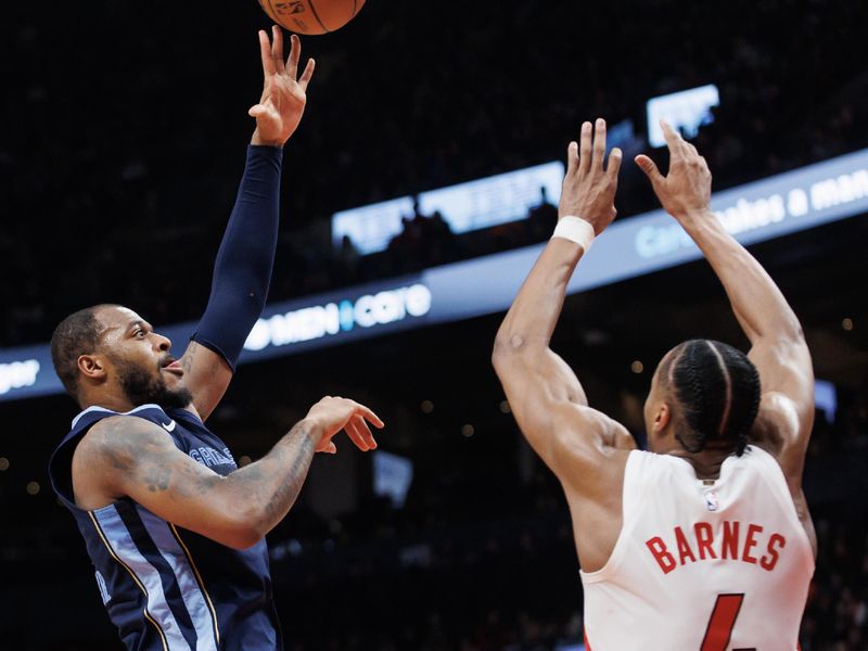 TORONTO, CANADA - JANUARY 22: Xavier Tillman #2 of the Memphis Grizzlies puts up a shot over Scottie Barnes #4 of the Toronto Raptors during the second half at Scotiabank Arena on January 22, 2024 in Toronto, Canada. NOTE TO USER: User expressly acknowledges and agrees that, by downloading and or using this photograph, User is consenting to the terms and conditions of the Getty Images License Agreement. (Photo by Cole Burston/Getty Images)