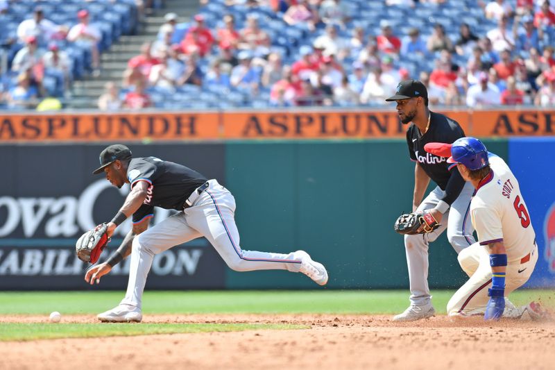 Jun 30, 2024; Philadelphia, Pennsylvania, USA; Miami Marlins shortstop Tim Anderson (7) makes an error against the Philadelphia Phillies during the sixth inning at Citizens Bank Park. Mandatory Credit: Eric Hartline-USA TODAY Sports