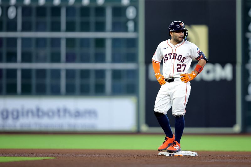 Apr 30, 2025; Houston, Texas, USA; Houston Astros designated hitter Jose Altuve (27) stands on second base after hitting an RBI double against the Detroit Tigers during the fifth inning at Daikin Park. Mandatory Credit: Erik Williams-Imagn Images