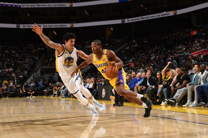 SAN FRANCISCO, CA - OCTOBER 18: Quincy Olivari #41 of the Los Angeles Lakers drives to the basket during the game against the Golden State Warriors during a NBA Preseason game on October 18, 2024 at Chase Center in San Francisco, California. NOTE TO USER: User expressly acknowledges and agrees that, by downloading and or using this photograph, user is consenting to the terms and conditions of Getty Images License Agreement. Mandatory Copyright Notice: Copyright 2024 NBAE (Photo by Noah Graham/NBAE via Getty Images)