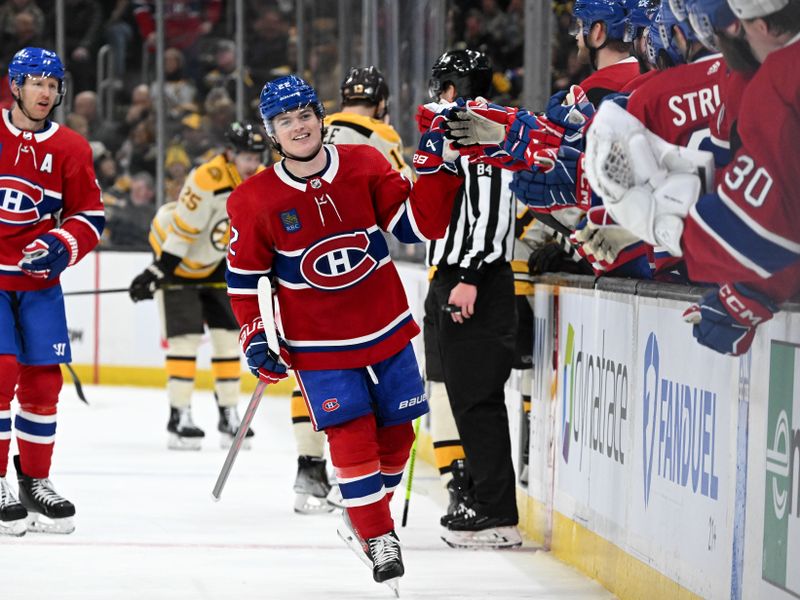 Jan 20, 2024; Boston, Massachusetts, USA; Montreal Canadiens right wing Cole Caufield (22) celebrates with his teammates after scoring a goal against the Boston Bruins during the first period at the TD Garden. Mandatory Credit: Brian Fluharty-USA TODAY Sports