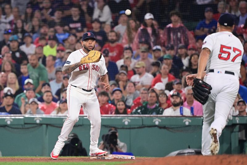 Jul 28, 2024; Boston, Massachusetts, USA; Boston Red Sox first baseman Dominic Smith (2) makes a catch for an out against the New York Yankees during the eighth inning at Fenway Park. Mandatory Credit: Eric Canha-USA TODAY Sports