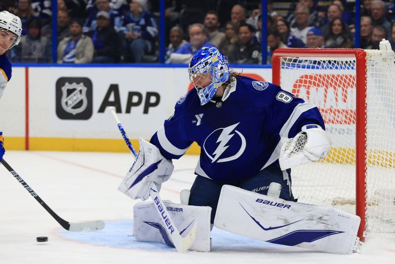 Feb 3, 2026; Tampa, Florida, USA; Tampa Bay Lightning goaltender Andrei Vasilevskiy (88) defends the puck against the Buffalo Sabres during the second period at Benchmark International Arena. Mandatory Credit: Kim Klement Neitzel-Imagn Images