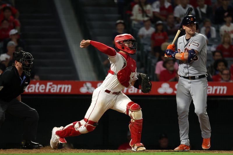 Sep 16, 2023; Anaheim, California, USA;  Los Angeles Angels catcher Logan O'Hoppe (14) throws the ball to second on a steal by Detroit Tigers center fielder Parker Meadows (22) during the tenth inning at Angel Stadium. Mandatory Credit: Kiyoshi Mio-USA TODAY Sports