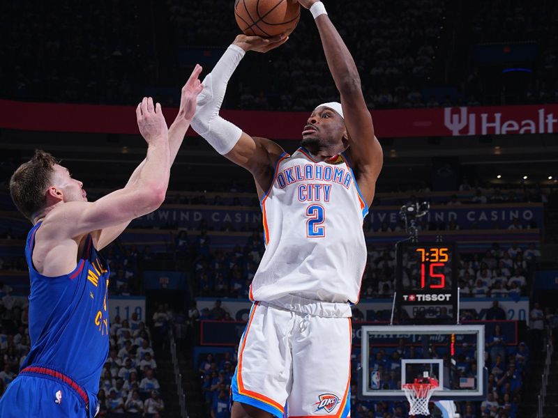 OKLAHOMA CITY, OK - MAY 13:  Shai Gilgeous-Alexander #2 of the Oklahoma City Thunder shoots the ball during the game against the Denver Nuggets  during Round 2 Game 5 of the 2025 NBA Playoffs on May 13, 2025 at Paycom Center in Oklahoma City, Oklahoma. NOTE TO USER: User expressly acknowledges and agrees that, by downloading and or using this photograph, User is consenting to the terms and conditions of the Getty Images License Agreement. Mandatory Copyright Notice: Copyright 2025 NBAE (Photo by Garrett Ellwood/NBAE via Getty Images)