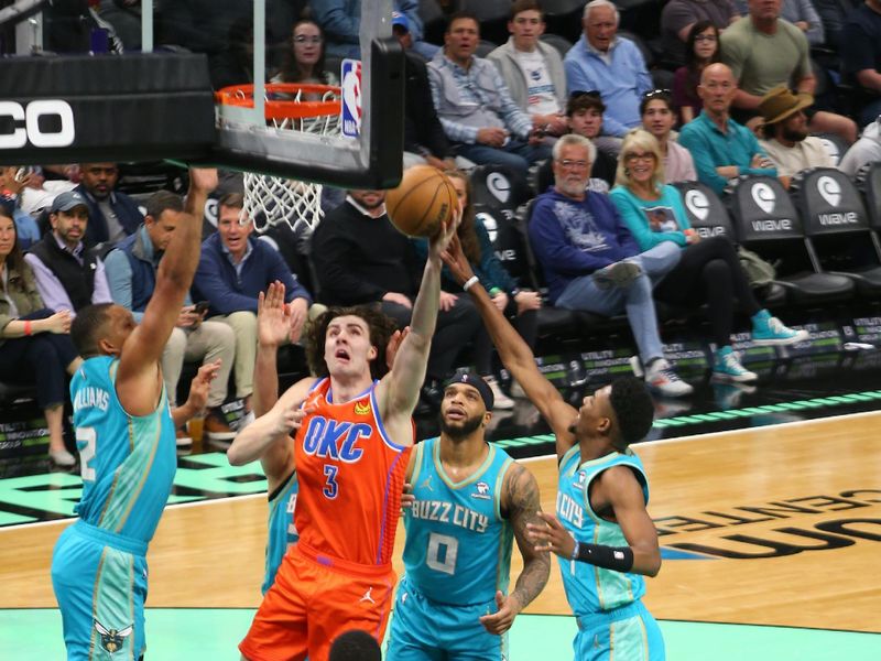 CHARLOTTE, NC - APRIL 7: Josh Giddey #3 of the Oklahoma City Thunder drives to the basket during the game against the Charlotte Hornets on April 7, 2024 at Spectrum Center in Charlotte, North Carolina. NOTE TO USER: User expressly acknowledges and agrees that, by downloading and or using this photograph, User is consenting to the terms and conditions of the Getty Images License Agreement. Mandatory Copyright Notice: Copyright 2024 NBAE (Photo by Kent Smith/NBAE via Getty Images)