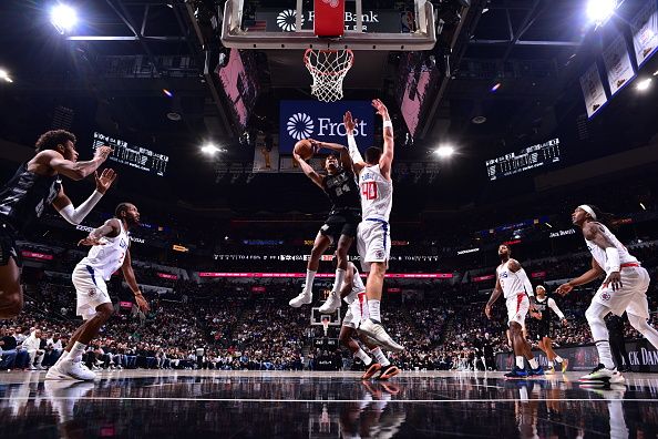 SAN ANTONIO, TX - NOVEMBER 22: Devin Vassell #24 of the San Antonio Spurs drives to the basket during the game against the LA Clippers on November 22, 2023 at the Frost Bank Center in San Antonio, Texas. NOTE TO USER: User expressly acknowledges and agrees that, by downloading and or using this photograph, user is consenting to the terms and conditions of the Getty Images License Agreement. Mandatory Copyright Notice: Copyright 2023 NBAE (Photos by Michael Gonzales/NBAE via Getty Images)