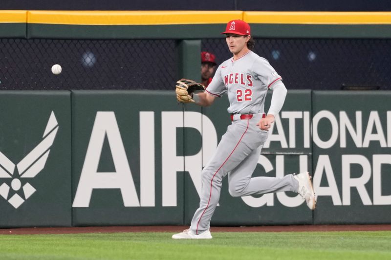 Sep 7, 2024; Arlington, Texas, USA; Los Angeles Angels center fielder Bryce Teodosio (22) chases a double hit by Texas Rangers third baseman Josh Jung (not pictured) during the eighth inning at Globe Life Field. Mandatory Credit: Jim Cowsert-Imagn Images