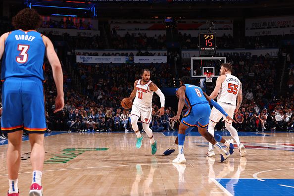 OKLAHOMA CITY, OK - DECEMBER 27: Jalen Brunson #11 of the New York Knicks dribbles the ball during the game against the Oklahoma City Thunder on December 27, 2023 at Paycom Arena in Oklahoma City, Oklahoma. NOTE TO USER: User expressly acknowledges and agrees that, by downloading and or using this photograph, User is consenting to the terms and conditions of the Getty Images License Agreement. Mandatory Copyright Notice: Copyright 2023 NBAE (Photo by Zach Beeker/NBAE via Getty Images)