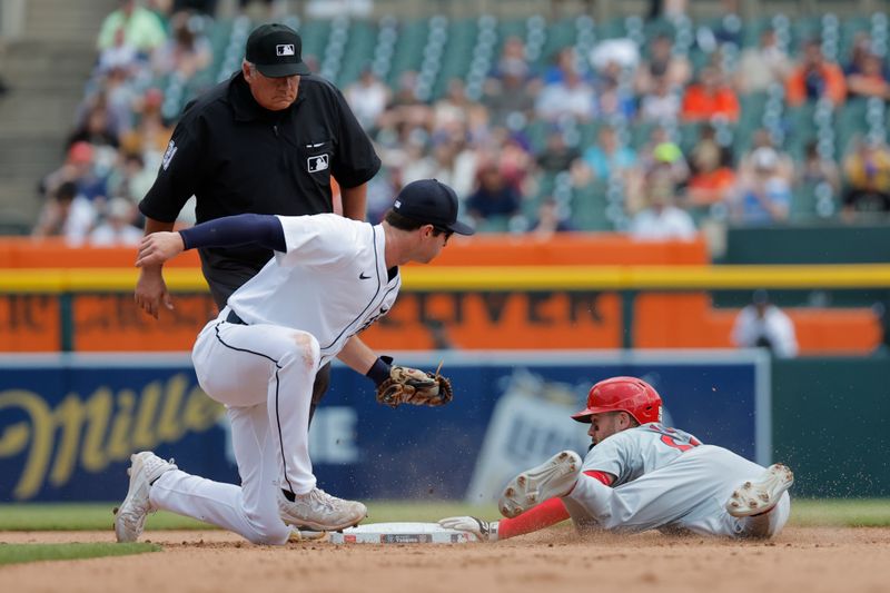 May 1, 2024; Detroit, Michigan, USA; St. Louis Cardinals center fielder Michael Siani (63) is tagged out by Detroit Tigers second baseman Colt Keith (33) attempting to steal second in the sixth inning at Comerica Park. Mandatory Credit: Rick Osentoski-USA TODAY Sports