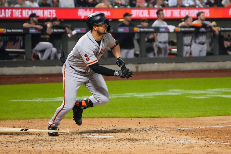 Jul 2, 2023; New York City, New York, USA; San Francisco Giants designated hitter J.D. Davis (7) hits an RBI double against the New York Mets during the seventh inning at Citi Field. Mandatory Credit: Gregory Fisher-USA TODAY Sports