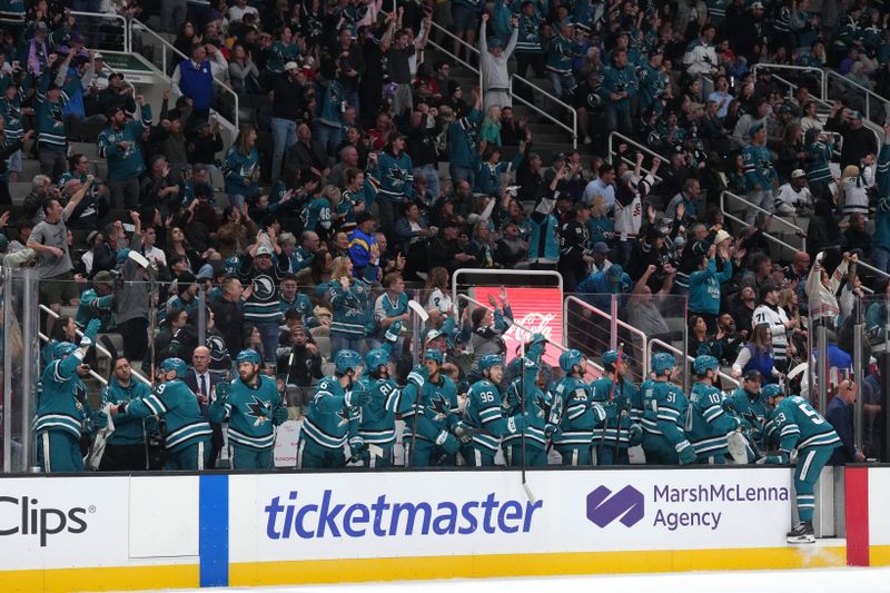 Nov 8, 2025; San Jose, California, USA; San Jose Sharks players and fans react after a goal by center Macklin Celebrini (not shown) during the first period against the Florida Panthers at SAP Center at San Jose. Mandatory Credit: Darren Yamashita-Imagn Images
