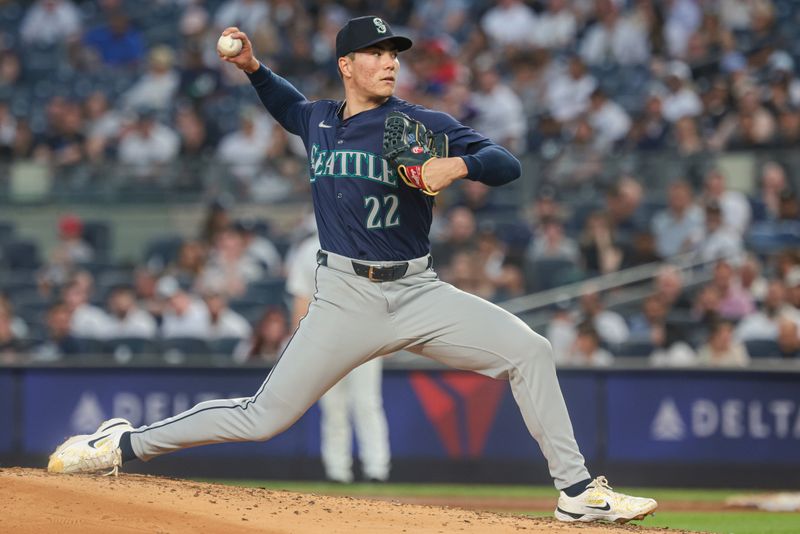 May 21, 2024; Bronx, New York, USA; Seattle Mariners starting pitcher Bryan Woo (22) delivers a pitch during the fourth inning against the New York Yankees  at Yankee Stadium. Mandatory Credit: Vincent Carchietta-USA TODAY Sports