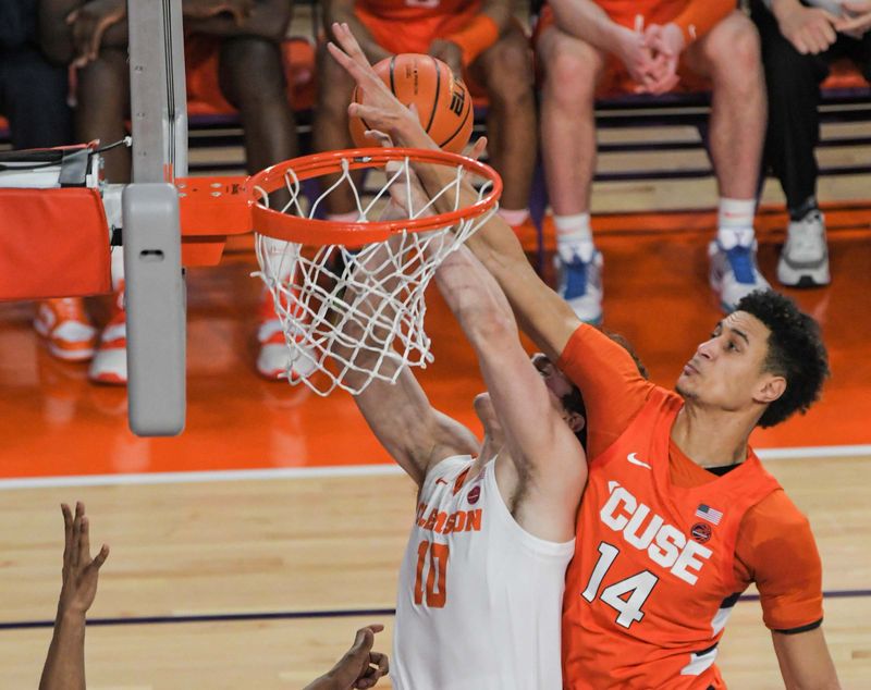 Feb 22, 2023; Clemson, South Carolina, USA; Clemson sophomore forward Ben Middlebrooks (10) shoots against Syracuse center Jesse Edwards (14) during the first half at Littlejohn Coliseum. Mandatory Credit: Ken Ruinard-USA TODAY Sports