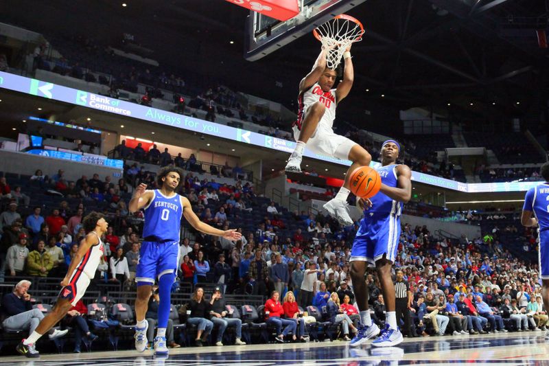 Jan 31, 2023; Oxford, Mississippi, USA; Mississippi Rebels forward Jayveous McKinnis (0) dunks during the second half against the Kentucky Wildcats at The Sandy and John Black Pavilion at Ole Miss. Mandatory Credit: Petre Thomas-USA TODAY Sports