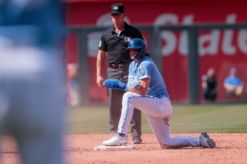 Jun 3, 2023; Kansas City, Missouri, USA; Kansas City Royals shortstop Bobby Witt Jr. (7) sits at second base after a steal during the third inning against the Colorado Rockies at Kauffman Stadium. Mandatory Credit: William Purnell-USA TODAY Sports