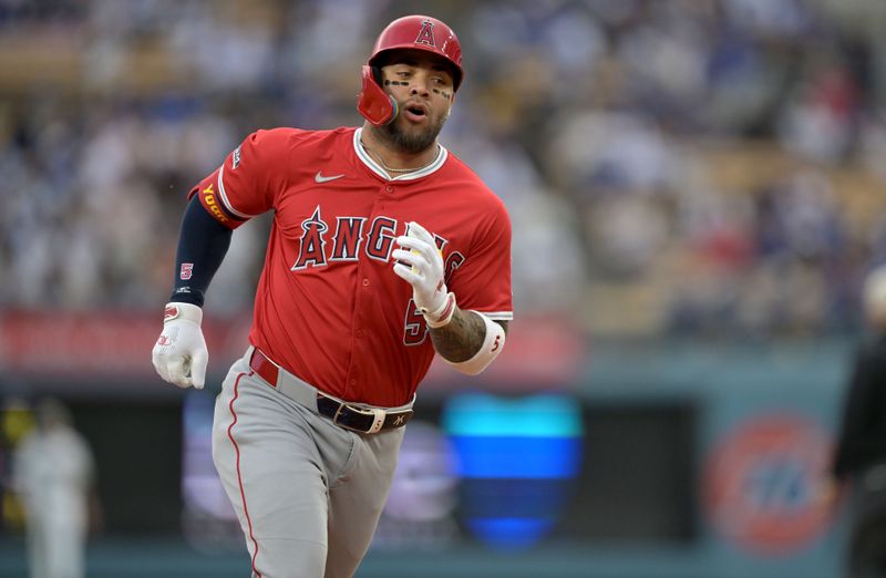 May 16, 2025; Los Angeles, California, USA; Los Angeles Angels third baseman Yoan Moncada (5) runs the bases after a two-run home run during the first inning against the Los Angeles Dodgers at Dodger Stadium. Mandatory Credit: Jayne Kamin-Oncea-Imagn Images
