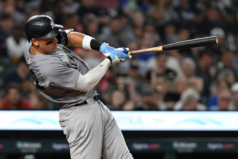 Aug 16, 2024; Detroit, Michigan, USA; New York Yankees center fielder Aaron Judge (99) hits a solo home run against the Detroit Tigers in the eighth inning at Comerica Park. Mandatory Credit: Lon Horwedel-USA TODAY Sports