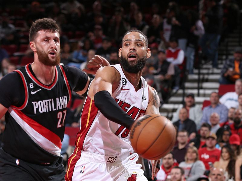 PORTLAND, OR - OCTOBER 26: Caleb Martin #16 of the Miami Heat passes the ball against the Portland Trail Blazers on October 26, 2022 at the Moda Center Arena in Portland, Oregon. NOTE TO USER: User expressly acknowledges and agrees that, by downloading and or using this photograph, user is consenting to the terms and conditions of the Getty Images License Agreement. Mandatory Copyright Notice: Copyright 2022 NBAE (Photo by Cameron Browne/NBAE via Getty Images)