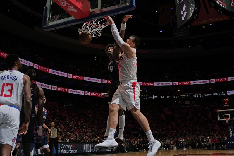 PHILADELPHIA, PA - MARCH 27: Ivica Zubac #40 of the LA Clippers dunks the ball during the game against the Philadelphia 76ers on March 27, 2024 at the Wells Fargo Center in Philadelphia, Pennsylvania NOTE TO USER: User expressly acknowledges and agrees that, by downloading and/or using this Photograph, user is consenting to the terms and conditions of the Getty Images License Agreement. Mandatory Copyright Notice: Copyright 2024 NBAE (Photo by Jesse D. Garrabrant/NBAE via Getty Images)