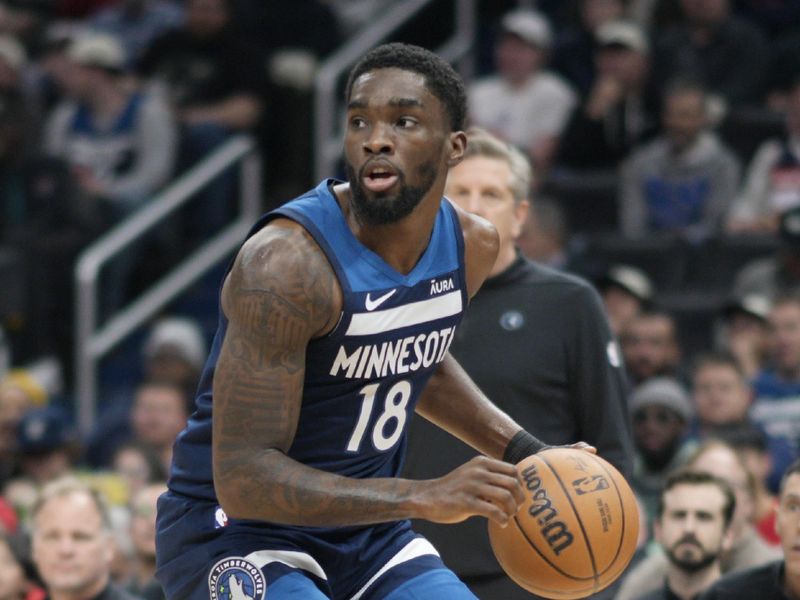 WASHINGTON, DC - JANUARY 24: Shake Milton #18 of the Minnesota Timberwolves dribbles the ball during the first half against the Washington Wizards at Capital One Arena on January 24, 2024 in Washington, DC. NOTE TO USER: User expressly acknowledges and agrees that, by downloading and or using this photograph, User is consenting to the terms and conditions of the Getty Images License Agreement. (Photo by Jess Rapfogel/Getty Images)