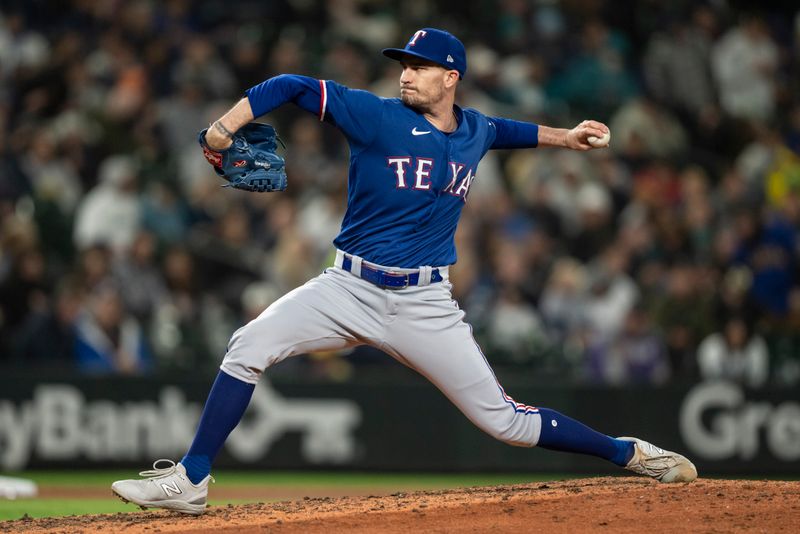 Sep 28, 2023; Seattle, Washington, USA; Texas Rangers reliever Andrew Heaney (44) delivers a pitch during the seventh inning against the Seattle Mariners at T-Mobile Park. Mandatory Credit: Stephen Brashear-USA TODAY Sports