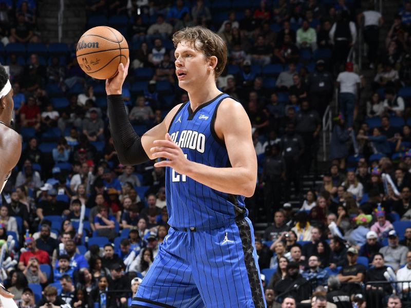 ORLANDO, FL - FEBRUARY 27: Moritz Wagner #21 of the Orlando Magic looks to pass the ball during the game against the Brooklyn Nets on February 27, 2024 at the Kia Center in Orlando, Florida. NOTE TO USER: User expressly acknowledges and agrees that, by downloading and or using this photograph, User is consenting to the terms and conditions of the Getty Images License Agreement. Mandatory Copyright Notice: Copyright 2024 NBAE (Photo by Fernando Medina/NBAE via Getty Images)