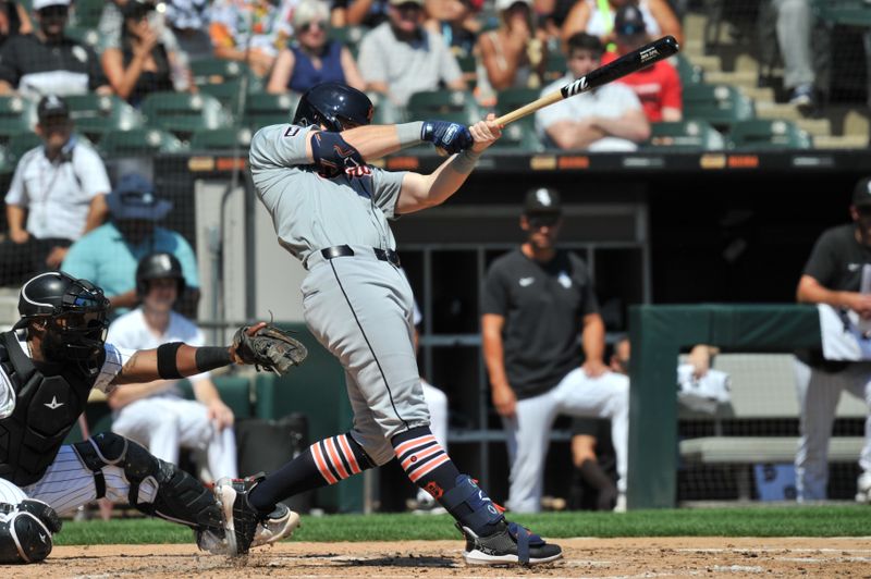 Aug 25, 2024; Chicago, Illinois, USA; Detroit Tigers second base Jace Jung (17) singles during the third inning against the Chicago White Sox at Guaranteed Rate Field. Mandatory Credit: Patrick Gorski-USA TODAY Sports