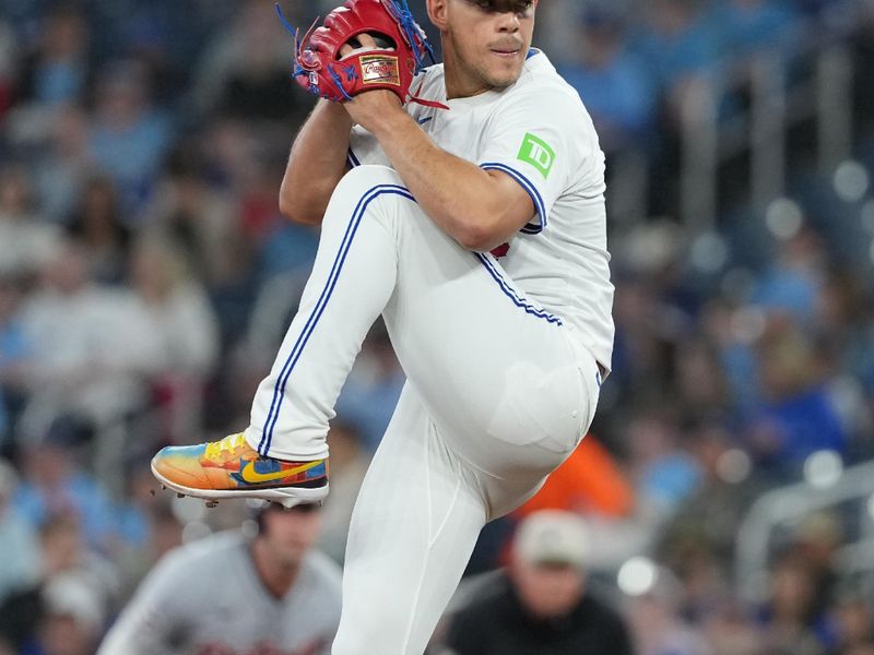 May 18, 2025; Toronto, Ontario, CAN; Toronto Blue Jays starting pitcher Jose Berríos (17) throws a pitch against the Detroit Tigers during the first inning at Rogers Centre. Mandatory Credit: Nick Turchiaro-Imagn Images