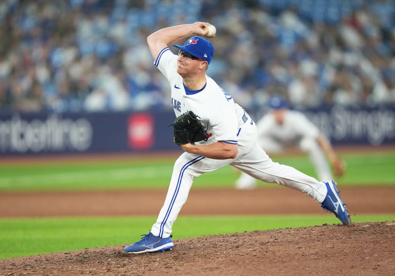 Jun 28, 2023; Toronto, Ontario, CAN; Toronto Blue Jays relief pitcher Trent Thornton (57) throws a pitch against the San Francisco Giants during the eighth inning at Rogers Centre. Mandatory Credit: Nick Turchiaro-USA TODAY Sports