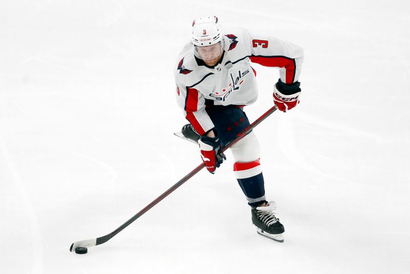 Mar 7, 2024; Pittsburgh, Pennsylvania, USA; Washington Capitals defenseman Nick Jensen (3) shoots the puck against the Pittsburgh Penguins during the third period at PPG Paints Arena. The Capitals shutout the Penguins 6-0. Mandatory Credit: Charles LeClaire-USA TODAY Sports