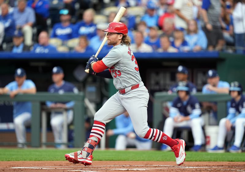 Aug 9, 2024; Kansas City, Missouri, USA; St. Louis Cardinals left fielder Brendan Donovan (33) hits a single during the first inning against the Kansas City Royals at Kauffman Stadium. Mandatory Credit: Jay Biggerstaff-USA TODAY Sports