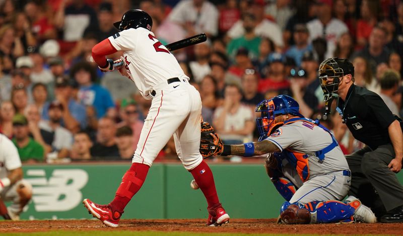 Jul 23, 2023; Boston, Massachusetts, USA; Boston Red Sox shortstop Yu Chang (20) hit by a pitch against the New York Mets in the eighth inning at Fenway Park. Mandatory Credit: David Butler II-USA TODAY Sports