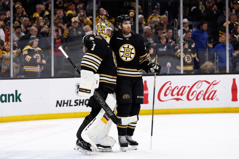 Jan 22, 2024; Boston, Massachusetts, USA; Boston Bruins defenseman Derek Forbort (28) hugs goaltender Jeremy Swayman (1) after their 4-1 win over the Winnipeg Jets at TD Garden. Mandatory Credit: Winslow Townson-USA TODAY Sports