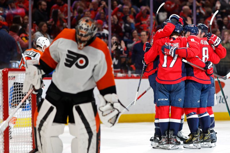 Mar 1, 2024; Washington, District of Columbia, USA; Washington Capitals right wing Anthony Mantha (39) celebrates with teammates after scoring a goal on Philadelphia Flyers goaltender Samuel Ersson (33) in the third period at Capital One Arena. Mandatory Credit: Geoff Burke-USA TODAY Sports