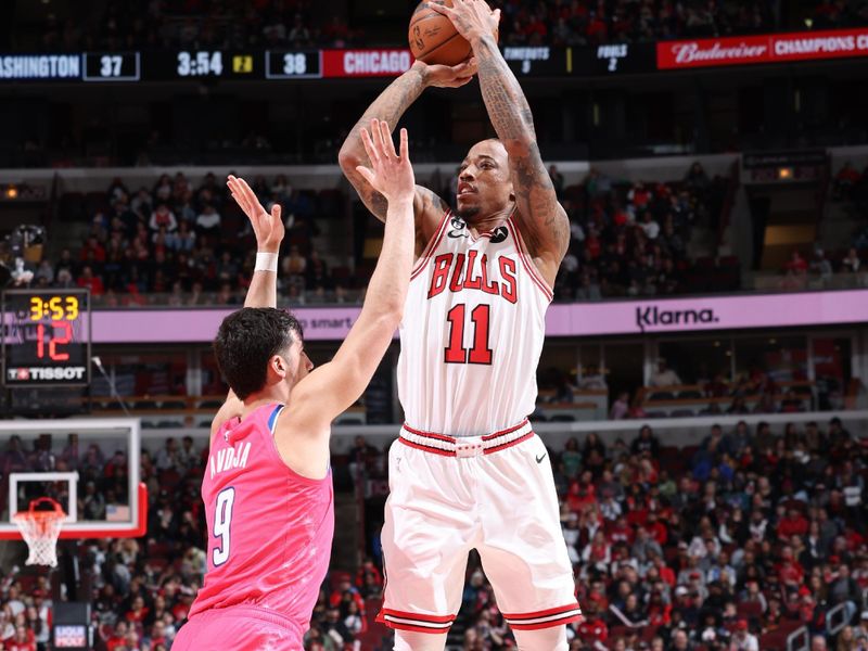 CHICAGO, IL - FEBRUARY 26: DeMar DeRozan #11 of the Chicago Bulls shoots the ball during the game against the Washington Wizards on February 26, 2023 at United Center in Chicago, Illinois. NOTE TO USER: User expressly acknowledges and agrees that, by downloading and or using this photograph, User is consenting to the terms and conditions of the Getty Images License Agreement. Mandatory Copyright Notice: Copyright 2023 NBAE (Photo by Jeff Haynes/NBAE via Getty Images)