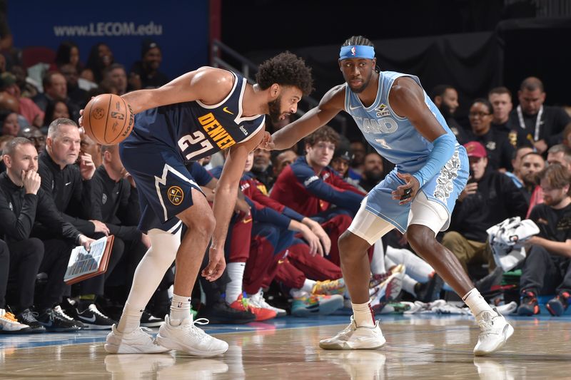 CLEVELAND, OH - DECEMBER 8: Jamal Murray #27 of the Denver Nuggets dribbles the ball during the game against the Cleveland Cavaliers on December 5, 2024 at Rocket Mortgage FieldHouse in Cleveland, Ohio. NOTE TO USER: User expressly acknowledges and agrees that, by downloading and/or using this Photograph, user is consenting to the terms and conditions of the Getty Images License Agreement. Mandatory Copyright Notice: Copyright 2024 NBAE (Photo by David Liam Kyle/NBAE via Getty Images)