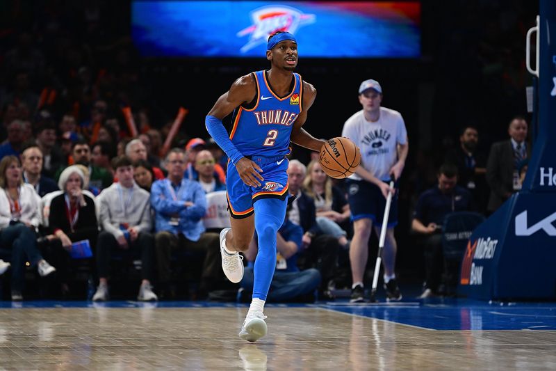 OKLAHOMA CITY, OKLAHOMA - JANUARY 31: Shai Gilgeous-Alexander #2 of the Oklahoma City Thunder handles the ball during the first half against the Denver Nuggets at Paycom Center on January 31, 2024 in Oklahoma City, Oklahoma. NOTE TO USER: User expressly acknowledges and agrees that, by downloading and or using this Photograph, user is consenting to the terms and conditions of the Getty Images License Agreement. (Photo by Joshua Gateley/Getty Images)