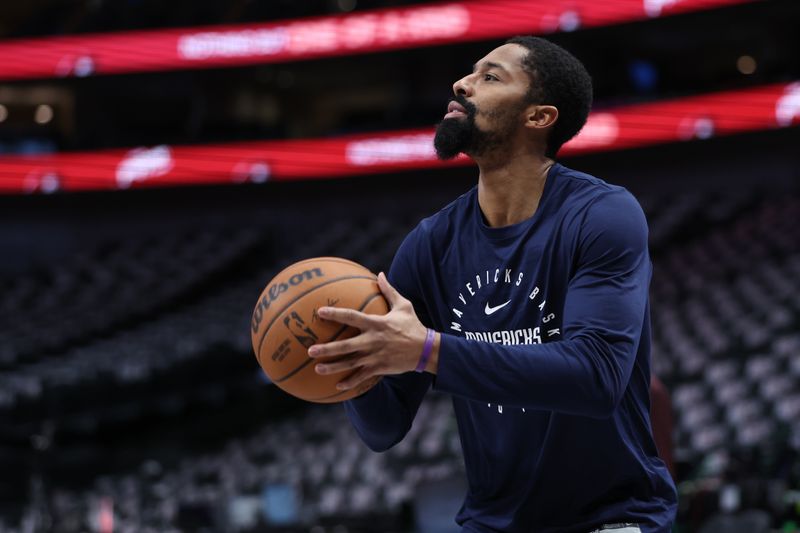 DALLAS, TX - NOVEMBER 16: Spencer Dinwiddie #26 of the Dallas Mavericks warms up before the game against the San Antonio Spurs on November 16, 2024 at American Airlines Center in Dallas, Texas. NOTE TO USER: User expressly acknowledges and agrees that, by downloading and or using this photograph, User is consenting to the terms and conditions of the Getty Images License Agreement. Mandatory Copyright Notice: Copyright 2024 NBAE (Photo by Tim Heitman/NBAE via Getty Images)