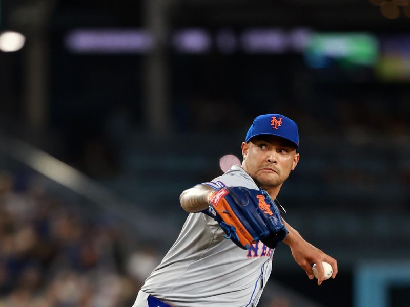 Apr 19, 2024; Los Angeles, California, USA;  New York Mets pitcher Sean Manaea (59) pitches during the fourth inning against the Los Angeles Dodgers at Dodger Stadium. Mandatory Credit: Kiyoshi Mio-USA TODAY Sports