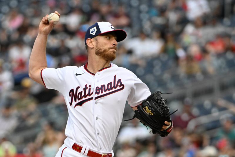 Apr 15, 2023; Washington, District of Columbia, USA; Washington Nationals starting pitcher Chad Kuhl (26) throws to the Cleveland Guardians during the third inning at Nationals Park. Mandatory Credit: Brad Mills-USA TODAY Sports