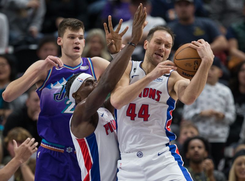 SALT LAKE CITY UT- NOVEMBER 23: Bojan Bogdanovic #44 and Jalen Duren #0 of the Detroit Pistons take a rebound away from Walker Kessler #24 of the Utah Jazz during the second half of their game November 23, 2022  at the Vivint Arena in Salt Lake City, Utah. NOTE TO USER: User expressly acknowledges and agrees that, by downloading and using this photograph, User is consenting to the terms and conditions of the Getty Images License Agreement (Photo by Chris Gardner/ Getty Images)