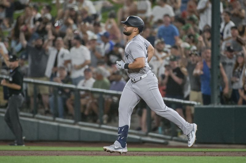 May 9, 2025; West Sacramento, California, USA; New York Yankees outfielder Jasson Dominguez (24) rounds the bases after hitting a grand slam against the Athletics during the eighth inning at Sutter Health Park. Mandatory Credit: Ed Szczepanski-Imagn Images