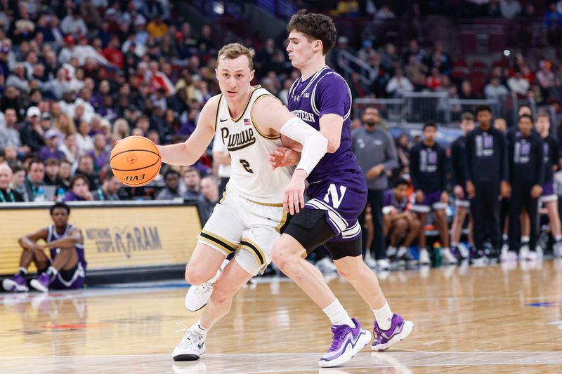 Mar 12, 2026; Chicago, IL, USA; Purdue Boilermakers guard Fletcher Loyer (2) drives to the basket against Northwestern Wildcats guard Jake West (3) during the second half at United Center. Mandatory Credit: Kamil Krzaczynski-Imagn Images Mar 12, 2026; Chicago, IL, USA; Purdue Boilermakers guard Fletcher Loyer (2) drives to the basket against Northwestern Wildcats guard Jake West (3) during the second half at United Center. Mandatory Credit: Kamil Krzaczynski-Imagn Images