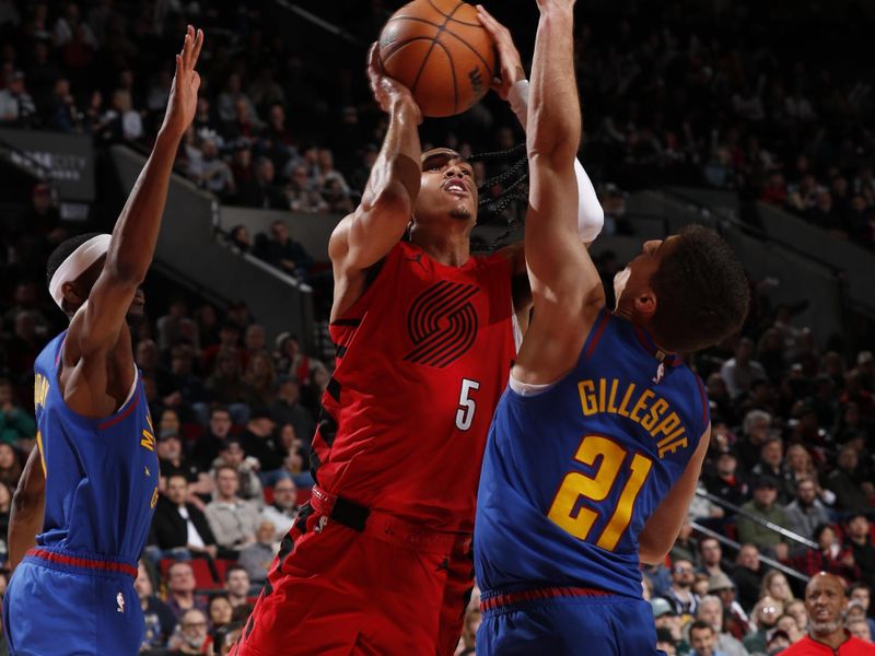 PORTLAND, OR - MARCH 23: Dalano Banton #5 of the Portland Trail Blazers drives to the basket during the game against the Denver Nuggets on March 23, 2024 at the Moda Center Arena in Portland, Oregon. NOTE TO USER: User expressly acknowledges and agrees that, by downloading and or using this photograph, user is consenting to the terms and conditions of the Getty Images License Agreement. Mandatory Copyright Notice: Copyright 2024 NBAE (Photo by Cameron Browne/NBAE via Getty Images)