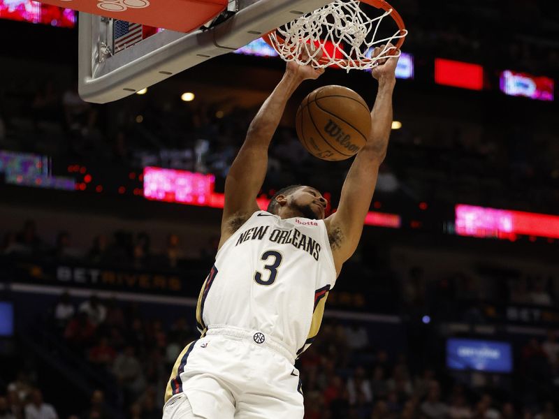 NEW ORLEANS, LOUISIANA - MARCH 28: CJ McCollum #3 of the New Orleans Pelicans dunks the ball against the Milwaukee Bucks at Smoothie King Center on March 28, 2024 in New Orleans, Louisiana. NOTE TO USER: User expressly acknowledges and agrees that, by downloading and or using this photograph, User is consenting to the terms and conditions of the Getty Images License Agreement.  (Photo by Chris Graythen/Getty Images)