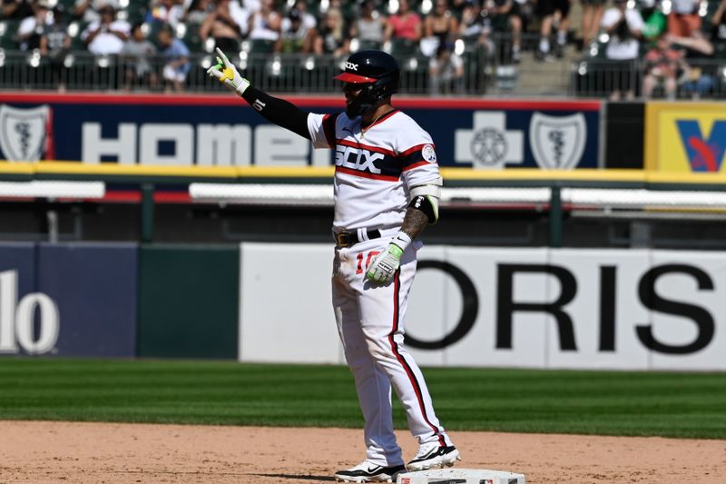 Aug 27, 2023; Chicago, Illinois, USA;  Chicago White Sox third baseman Yoan Moncada (10) points after he hits a two-RBI double against the Oakland Athletics seventh inning at Guaranteed Rate Field. Mandatory Credit: Matt Marton-USA TODAY Sports