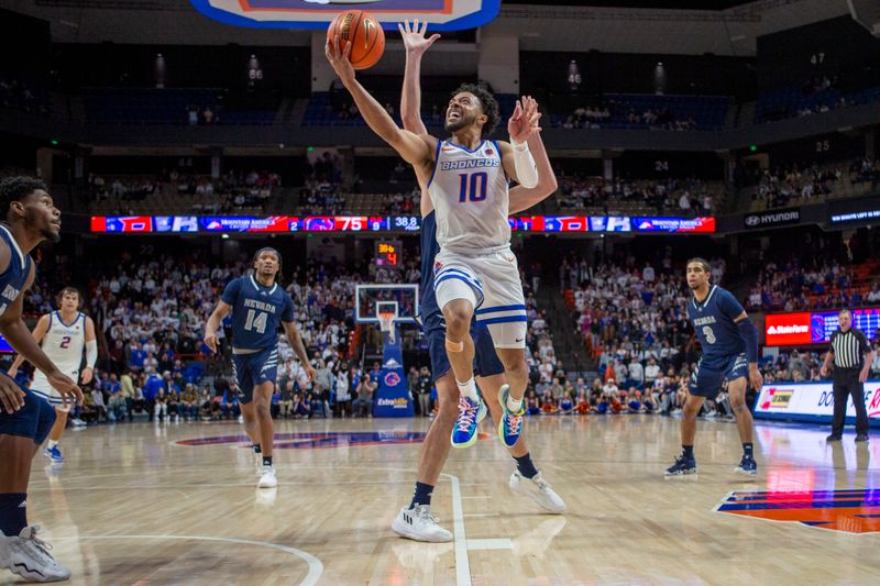 Jan 17, 2023; Boise, Idaho, USA; Boise State Broncos guard Marcus Shaver Jr. (10) shoots against the Nevada Wolf Pack during the second half at ExtraMile Arena. Boise State defeats Nevada 77-62. Mandatory Credit: Brian Losness-USA TODAY Sports

