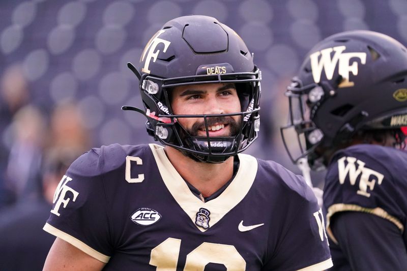 Oct 30, 2021; Winston-Salem, North Carolina, USA;  Wake Forest Demon Deacons quarterback Sam Hartman (10) smiles before the game against the Duke Blue Devils at Truist Field. Mandatory Credit: James Guillory-USA TODAY Sports